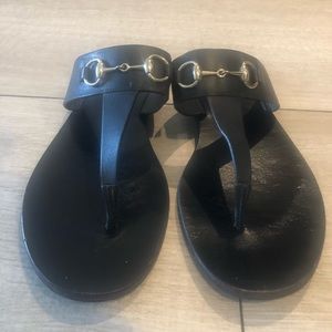 Black Gucci sandals